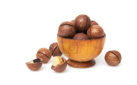 Photo for Macadamia nuts in bowl isolated on a white background - Royalty Free Image