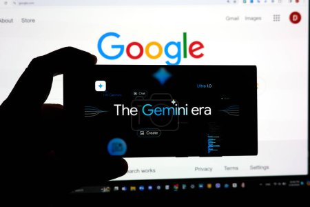 Photo for DALLAS, TX USA - FEBRUARY 19, 2024: A hand holding a cellphone with Google Gemini logo over google.com search page. Google Gemini 1.5 is a next generation large language model developed by Google AI - Royalty Free Image