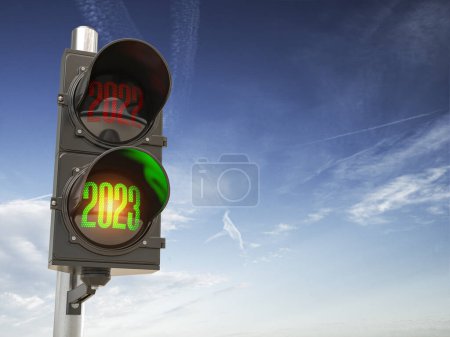 Traffic light with green light 2023 and red 2022 on sky background. Start New 2023 Year concept. 3d illustration