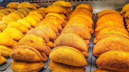 Photo for Typical empanadas from Madrid in a showcase - Royalty Free Image
