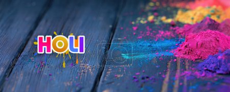 Happy Holi Social Media Banner Design with Colorful Powder (Gulal) Spreading on Wooden Table.