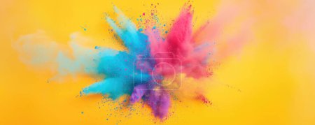 Holi Celebration Background - a spilled paint effect on a bright yellow background, giving off an impression similar to a tie-dyed pattern. The various colors include red, blue, and yellow, creating a lively and dynamic appearance. This stock photo c