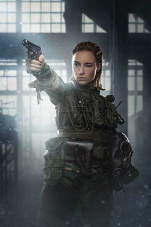 Photo for Portrait of military woman dressed in protective uniform in ruined building. - Royalty Free Image