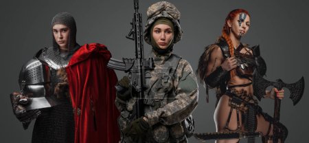 Photo for Studio shot of female soldier holding rifle with ancient amazon and knight woman. - Royalty Free Image