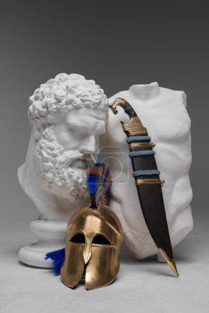 Photo for Studio shot of bust with body and helmet with knife of ancient greek soldier. - Royalty Free Image