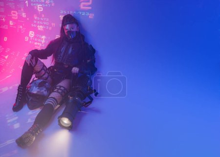 Photo for A woman in a futuristic tactical black suit lies on the floor, with a motorcycle helmet and a massive projector lying beside her, against a backdrop of projected digital symbols - Royalty Free Image