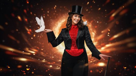 Photo for Captivating magician holding a wand with doves on a fiery background - Royalty Free Image