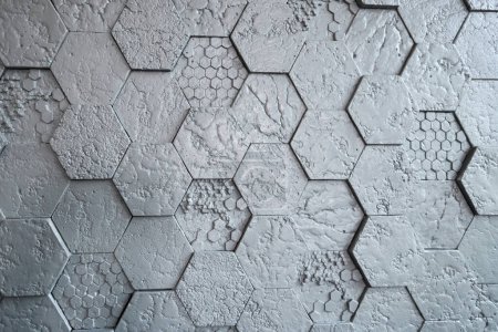 Fond en tuiles de gypse hexagonales grises, texturées, mosaïque. Rénovation moderne.