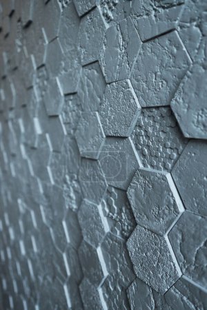 Fond en tuiles de gypse hexagonales grises, texturées, mosaïque. Rénovation moderne.