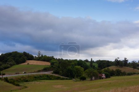 Photo for Real Panorama Landscape of hills at cloudy sky along the Chemin du Puy, French route of the Way of St James - Royalty Free Image