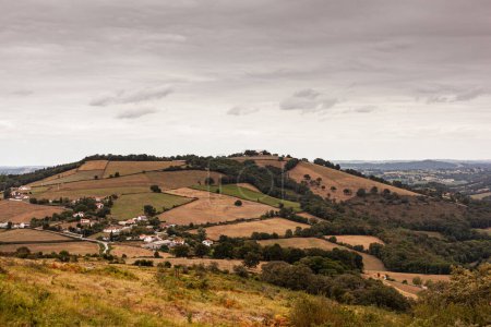 Photo for Top view of the cultivated Valley in France. Nature scenery along the Chemin du Puy. Way of Saint James - Royalty Free Image