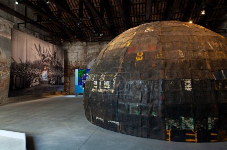 Foto de Venice, Italy - April 18, 2024: The installation titled Everything Precious for the Pavilion of Benin with the artists Chlo Quenum, Moufouli Bello, Ishola Akpo, Romuald Hazoum at the Arsenale during the 60th International Art exhibition of Venice - Imagen libre de derechos