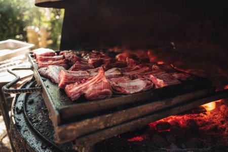 Photo for Cooking meat on a barbecue grill - Royalty Free Image