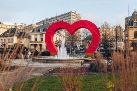 Photo for Luxembourg City, 01 December 2023 : The big red heart shape  installation at the Winterlights Christmas markets in the city - Royalty Free Image