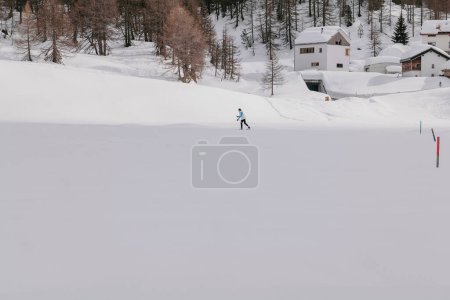 Photo for Saint Moritz, Switzerland - March 2024: Breathtaking mountains covered by snow around the Sils lake and Maloja village - Royalty Free Image