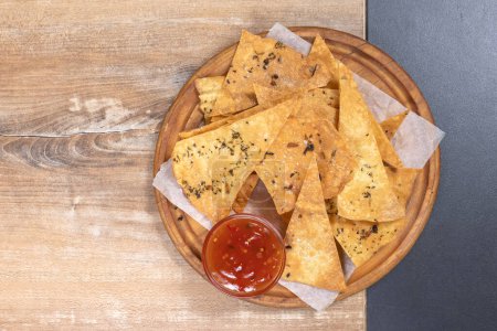 Photo for Mexican nachos tortilla chips with chili con carne - Royalty Free Image