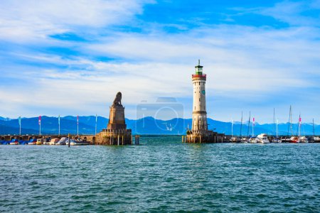 New Lindau Lighthouse and Bavarian Lion Sculpture at the Lindau harbor. Lindau is a major town and island on the Lake Constance or Bodensee in Bavaria, Germany.
