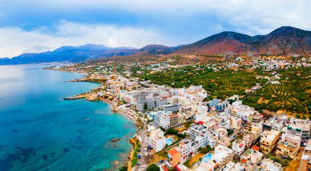 Hersonissos harbor aerial panoramic view. Hersonissos or Chersonissos is a town in the north of Crete island in Greece.