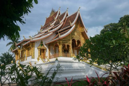 Photo for Haw Pha Bang golden buddhist temple, Luang Prabang preserved Unesco Heritage site, Laos - Royalty Free Image