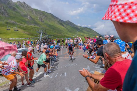 Photo for Col du Tourmalet, France: Mathieu van der Poel climbig the road to Col du Tourmalet in Pyerenees mountains during the stage 6 of Le Tour de France 2023. - Royalty Free Image