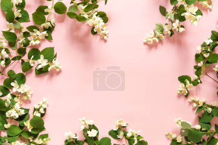 Photo for Beautiful flower arrangement. Jasmine flowers, free space for text on a light pastel background. Wedding, birthday. Valentine's day, mother's day. Top view, copy space - Royalty Free Image