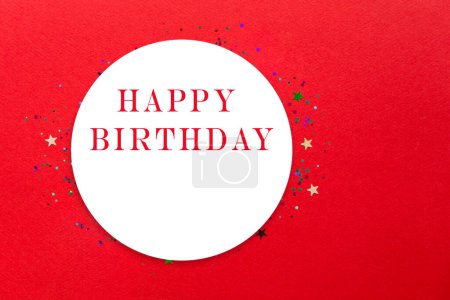 Photo for Festive frame or red background with colorful  confetti, star. Flat lay, mockup. Happy birthday or party greeting card with copy space. - Royalty Free Image
