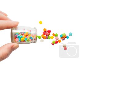 Foto de Salpicaduras de caramelo en todos los colores del arco iris aislado - Imagen libre de derechos