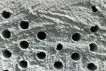 Foto de Material poroso poroso para la ventilación de aire con orificios - Imagen libre de derechos
