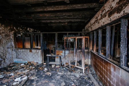 Burned interiors of hospital. Fire or war consequences concept.