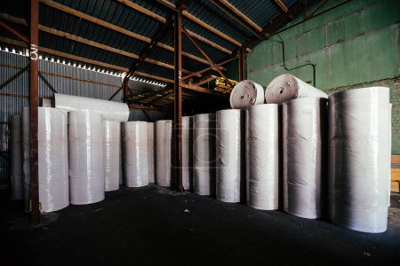 Photo for Rolls of recycled paper in the warehouse. - Royalty Free Image