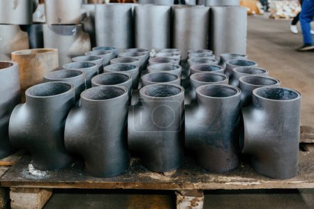 Photo for Batch of T shape pipe parts in factory. - Royalty Free Image