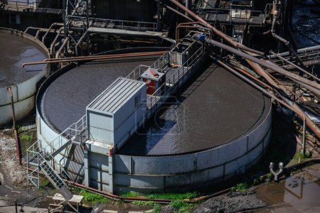 Round flotation basin at ore dressing plant, aerial view.