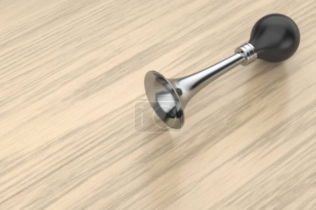 Ampoule à vélo corne sur bureau en bois