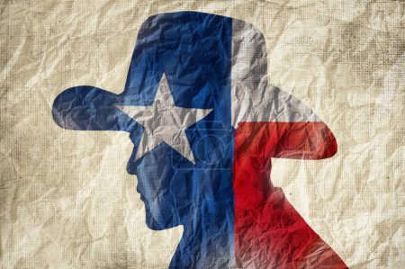 Téléchargez les photos : Silhouette de cow-boy avec drapeau texas sur fond de papier ridé - en image libre de droit