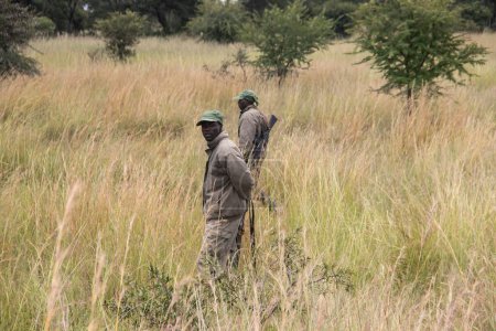 Rangers armed with guns in animal conservation park in Zimbabwe, in Imire Rhino and Wildlife Conservancy