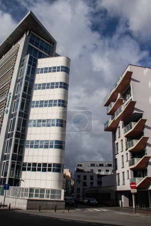 Photo for Urban metropolis modern architecture. Exterior with glass walls, reflecting surrounding buildings. Brand new buildings for business and office purposes - Royalty Free Image