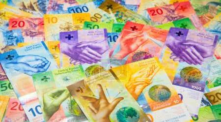 Téléchargez les photos : Colorful variety of Switzerland banknotes - en image libre de droit