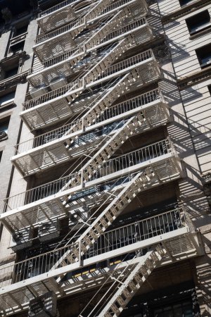 Foto de Fire escape stairs in the downtown New York city, USA - Imagen libre de derechos