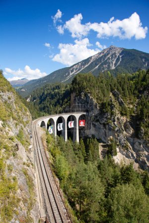 Photo for Famous Wiesener viaduct on the train line Davos -  Filisur in the swiss alps - Royalty Free Image