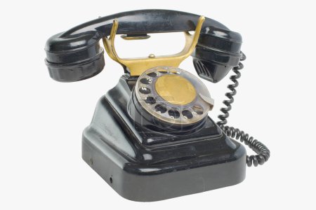 Foto de Viejo grunge vintage teléfono en blanco aislado - Imagen libre de derechos