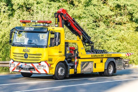 Photo for WETTENBERG, HESSE, GERMANY - 07 - 28 - 2023: MERCEDES BENZ ADAC tow truck on a street in Krofdorf-Gleiberg. - Royalty Free Image