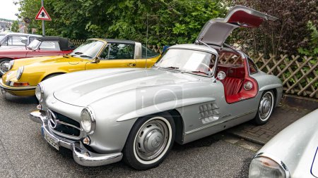 Photo for WETTENBERG, HESSE, GERMANY - 07 - 28 - 2023: MERCEDES BENZ 300 SL  is a two-seater supercar produced by the German manufacturer Mercedes-Benz between 1954 and 1963. - Royalty Free Image