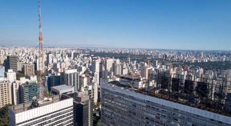 Photo for Aerial view of Jardim Paulista,  Jardins, Itaim Bibi and Ibirapuera neighborhoods from Avenida Paulista, near the Conjunto Nacional building. Sao Paulo city, Brazil. - Royalty Free Image