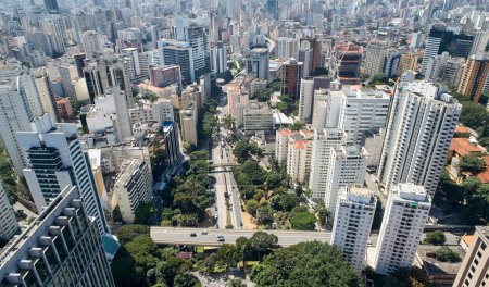 Aerial view of 9 de Julho avenue, commercial and residential buildings in the downtown in Sao Paulo city,  Brazil.
