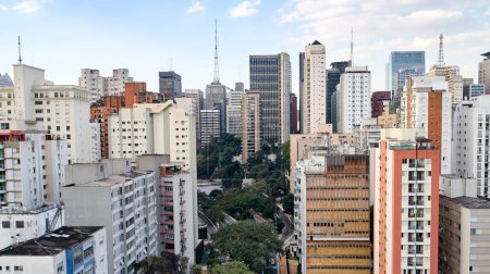 Photo for Aerial view of Nove de Julho avenue, commercial and residential buildings in the downtown in Sao Paulo city,  Brazil. - Royalty Free Image