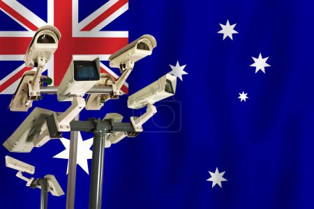 Téléchargez les photos : Caméra CCTV australienne sur le drapeau de l'Australie Surveillance, sécurité, contrôle et totalitarisme concept - en image libre de droit