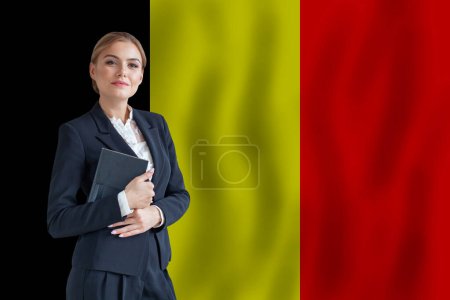 Foto de Belgium businesswoman on the flag of Belgium digital  nomad, business, startup concept - Imagen libre de derechos