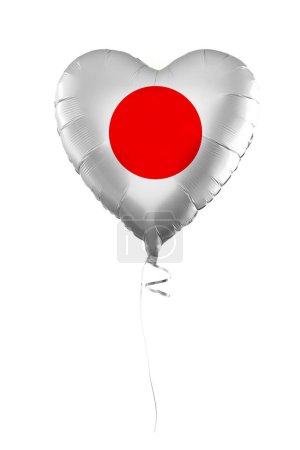 Foto de Japan concept. Balloon with Japanese flag isolated on white background. Education, charity, emigration, travel and learning language - Imagen libre de derechos