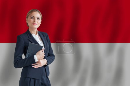 Foto de Indonesia empresaria en la bandera de Indonesia digital nomad, business, startup concept - Imagen libre de derechos