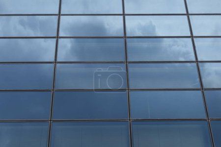 Photo for Glass facade of modern building with sky reflections abstract background. - Royalty Free Image